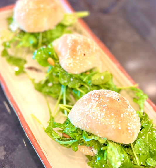 Tasche Verde or "Green Pockets" filled with arugula, pine nuts, feta cheese and a delicious olive oil dressing!